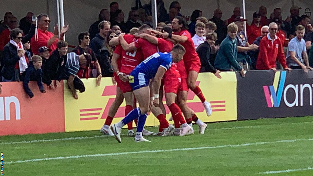 Jersey celebrate scoring a try