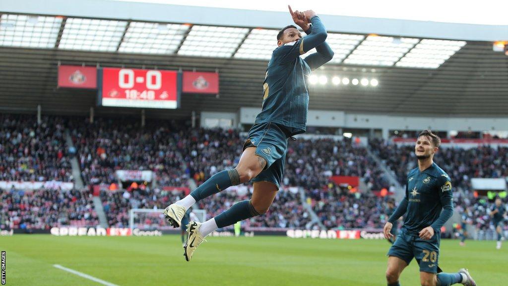 Ronald celebrates scoring for Swansea