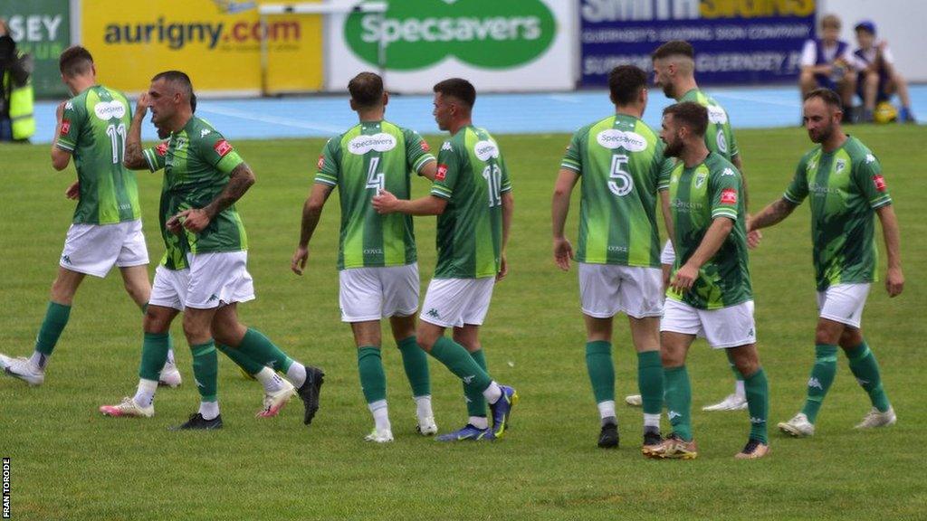 Guernsey FC players take to the field