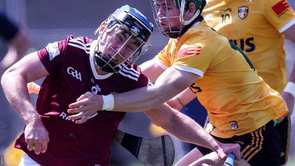 Westmeath's Charlie McCormack attempts to get past Antrim's Conal Cunning in Mullingar