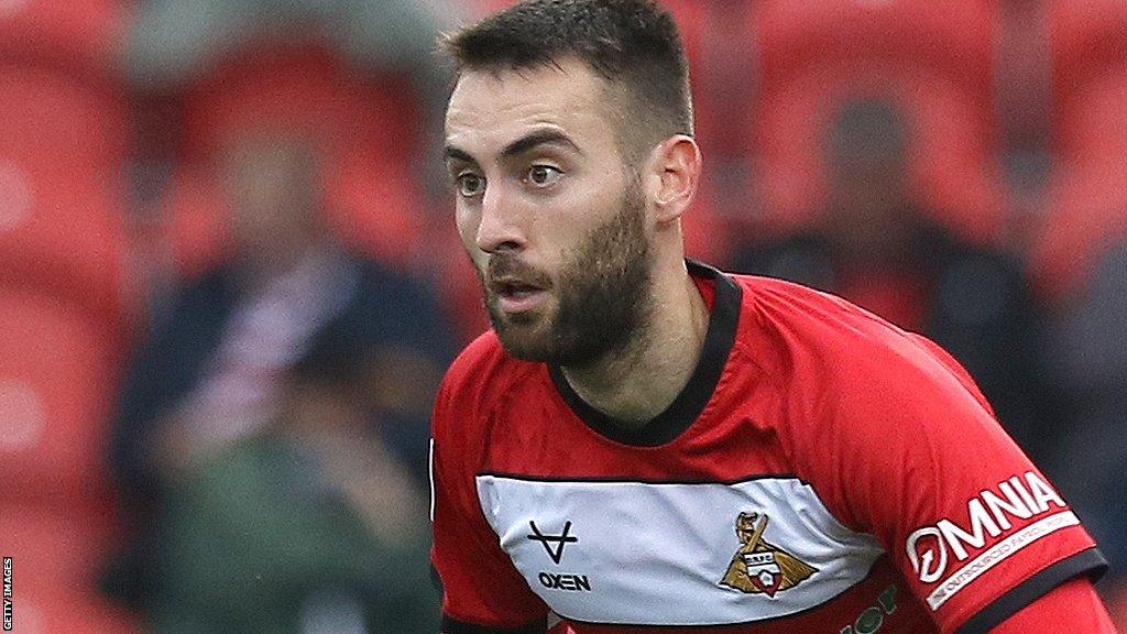 Doncaster midfielder Ben Close playing