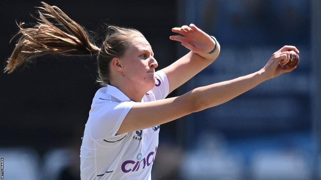 England's Lauren Filer bowls in a warm-up match against Australia A