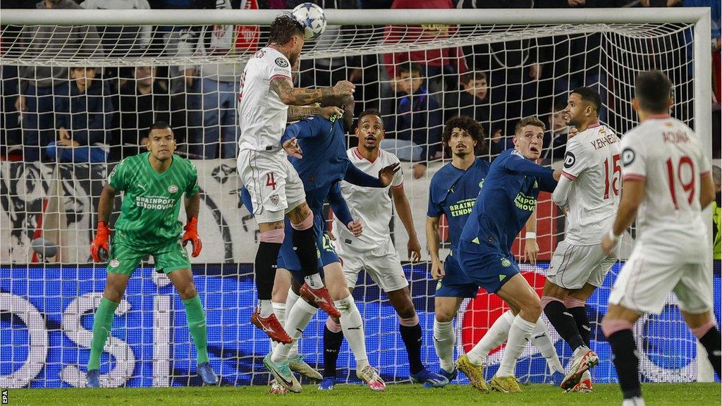 Sergio Ramos heads a ball