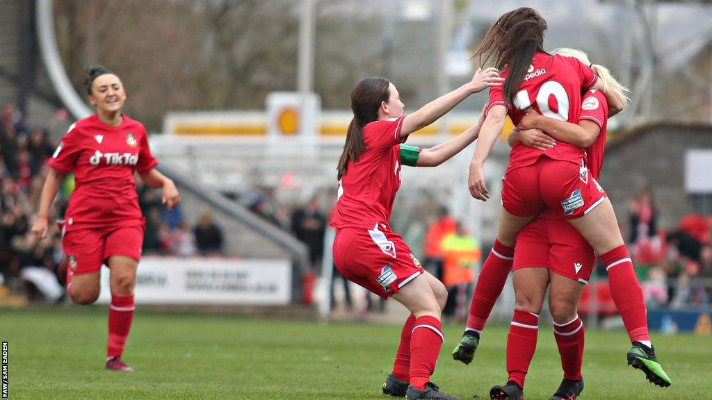 Wrexham players celebrate a goal