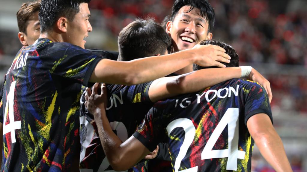 Hwang Hee-Chan & Son Heung-Min of South Korea celebrates with their team