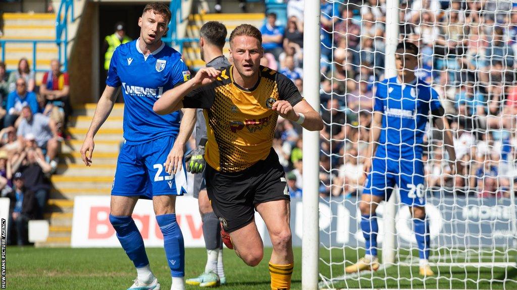 Cameron Norman of Newport County celebrates after opening the scoring