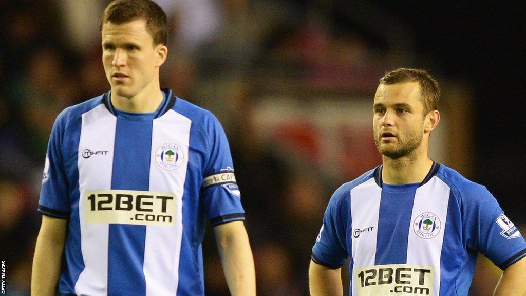 Gary Caldwell and Shaun Maloney playing for Wigan in 2013