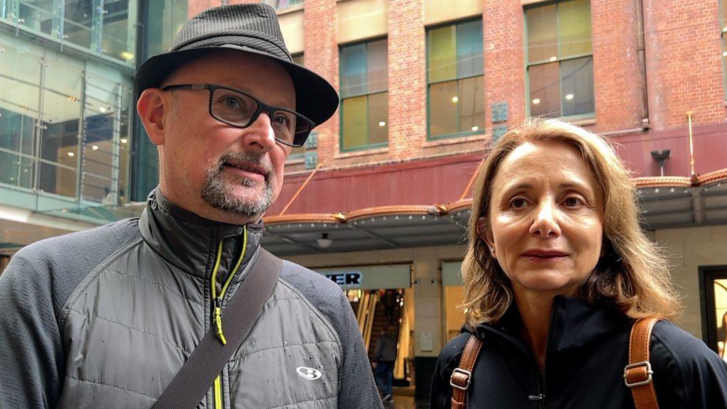 A man and a woman in Sydney speaking about the Queen's death