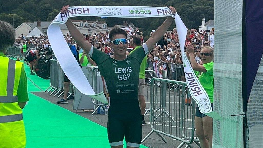 Josh Lewis win the triathlon