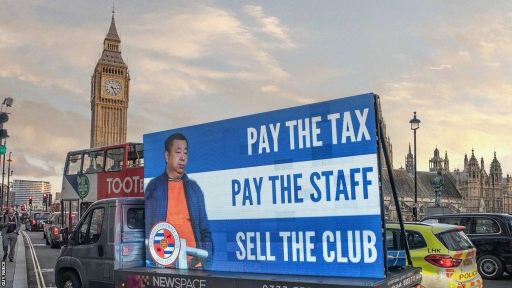 Screen protesting against Reading owner in front of Big Ben