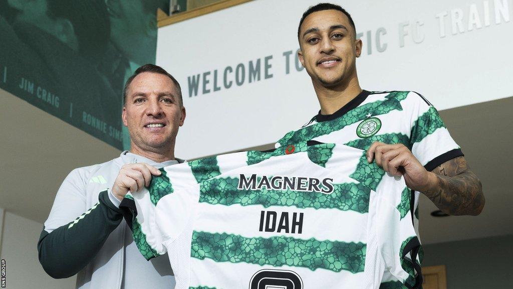 Celtic boss Brendan Rodgers poses with new arrival Adam Idah