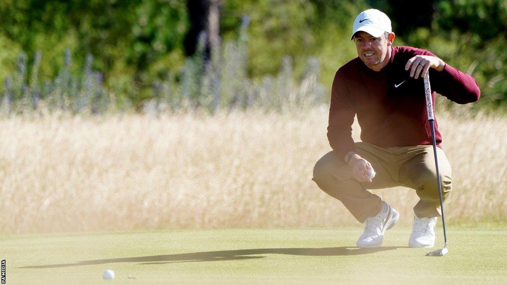 Rory McIlroy lines up a putt at The Renaissance Club