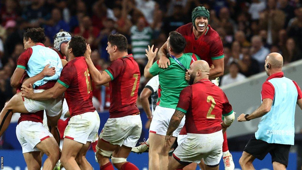 Portugal celebrate their win over Fiji at the Rugby World Cup