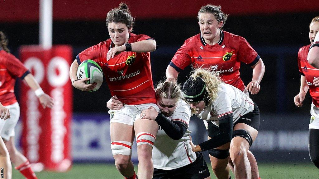 Munster's Deirbhile Nic a Bháird is tackled by Sadhbh McGrath of Ulster