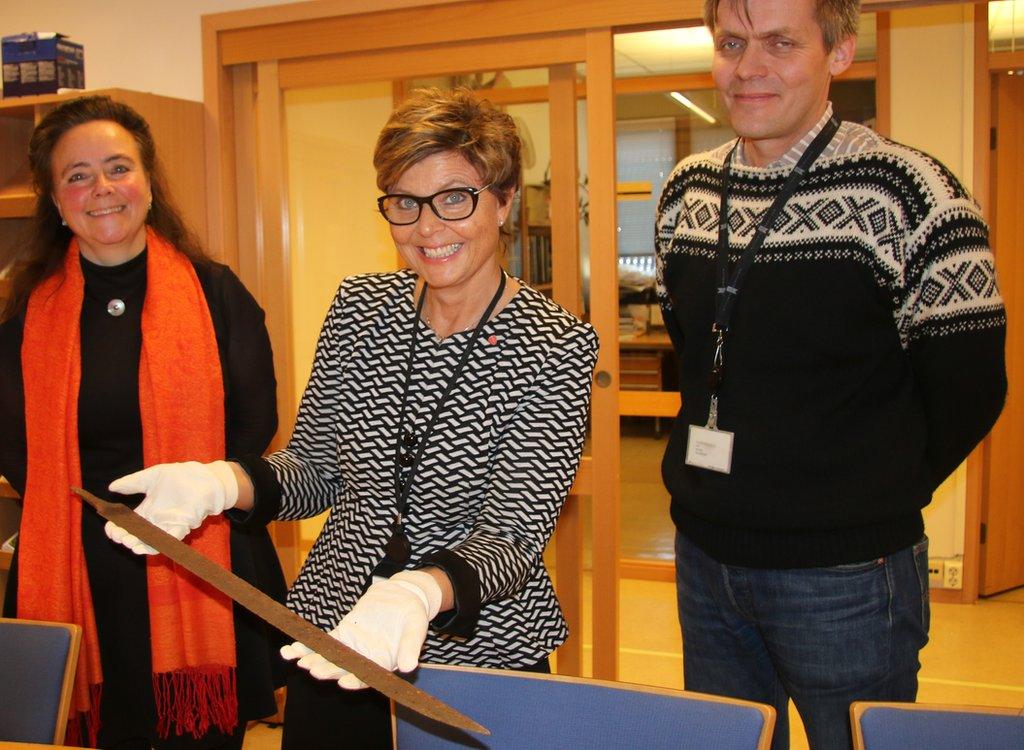 Archaeologist Holding the Viking Sword