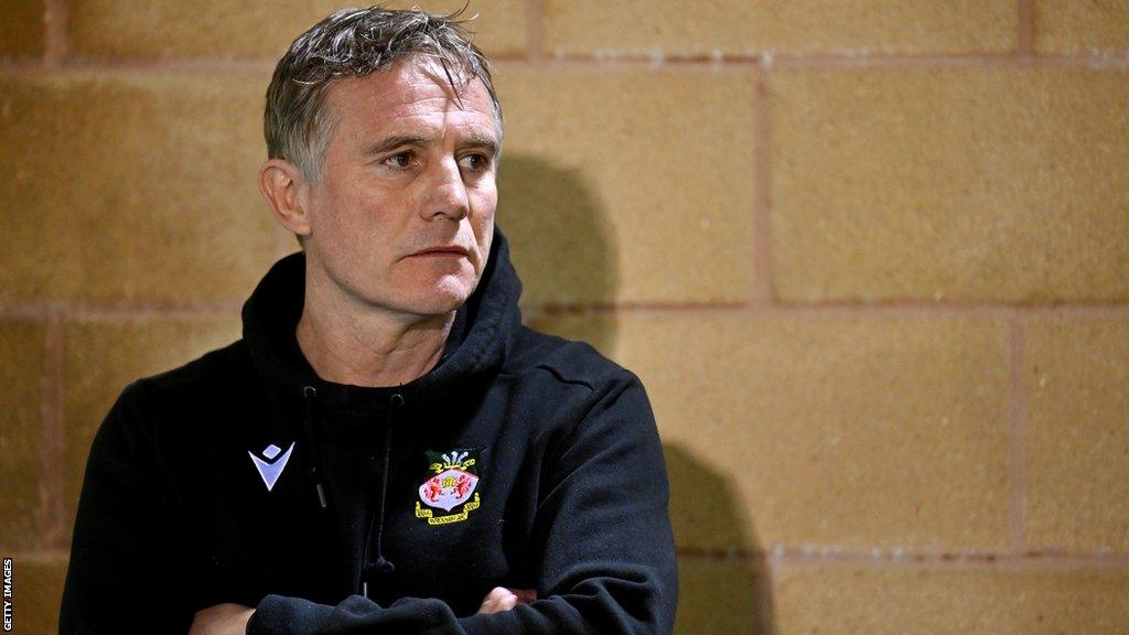 Wrexham boss Phil Parkinson looks on