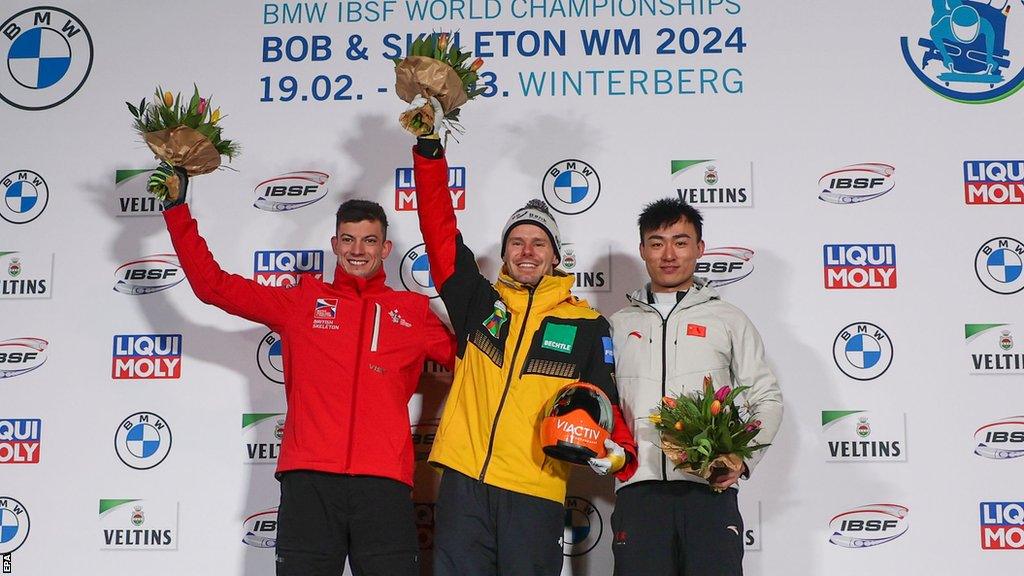 Matt Weston (left), Christopher Grotheer (centre), and Yin Zheng (right) celebrate after winning medals at the Skeleton World Championships