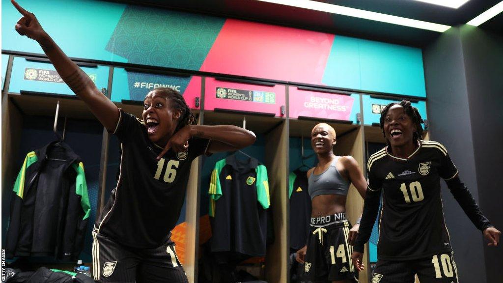 Paige Bailey-Gayle, Deneisha Blackwood and Jody Brown of Jamaica celebrate drawing 0-0 with France