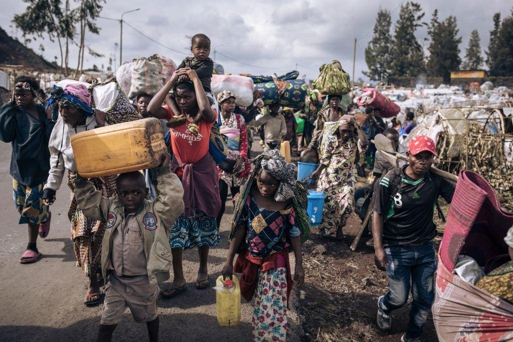 Displaced people flee towards the city of Goma, eastern Republic of Congo, on 15 November 2022.