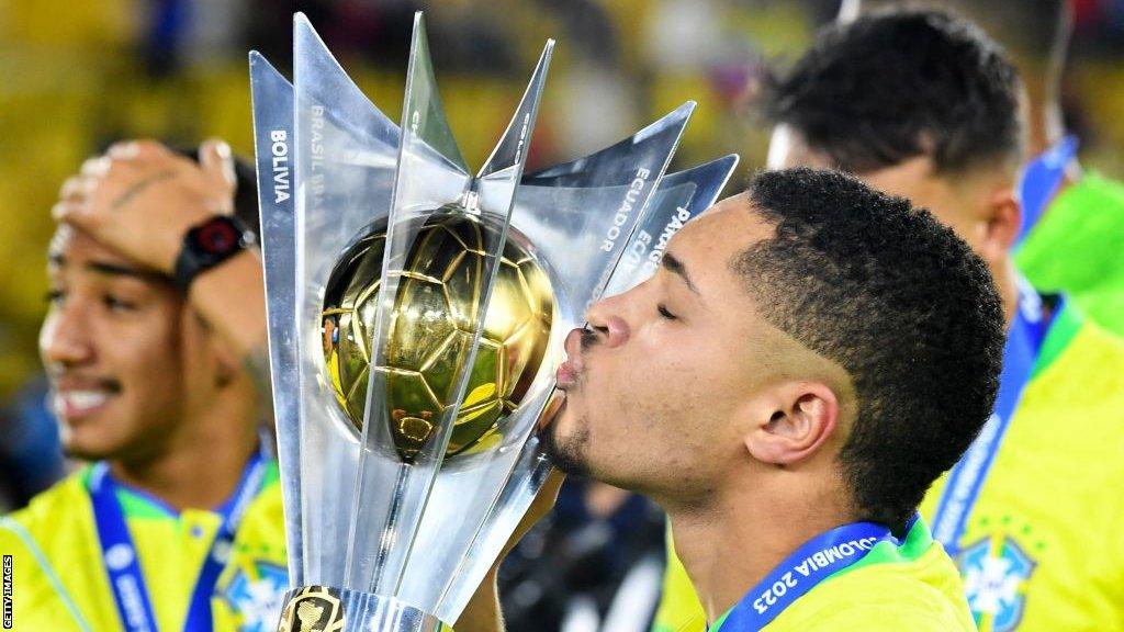 Brazil's Vitor Roque kisses the trophy after winning the South American U-20 football championship