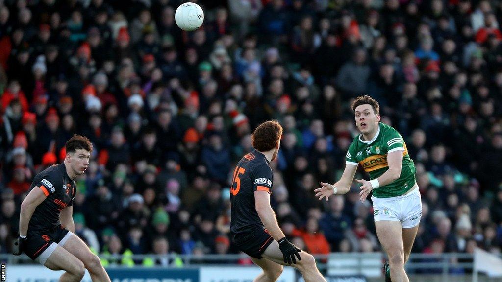 David Clifford battles with Armagh's Jason Duffy in Tralee