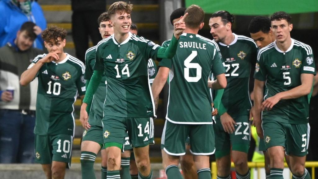 Isaac Price celebrates after putting Northern Ireland ahead against Denmark