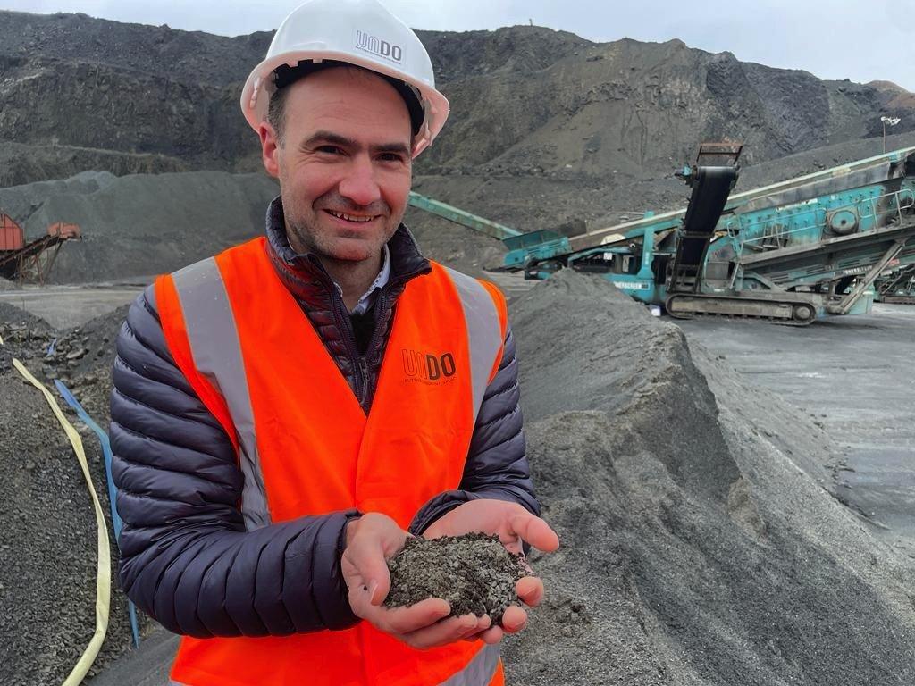 Jim holding basalt dust