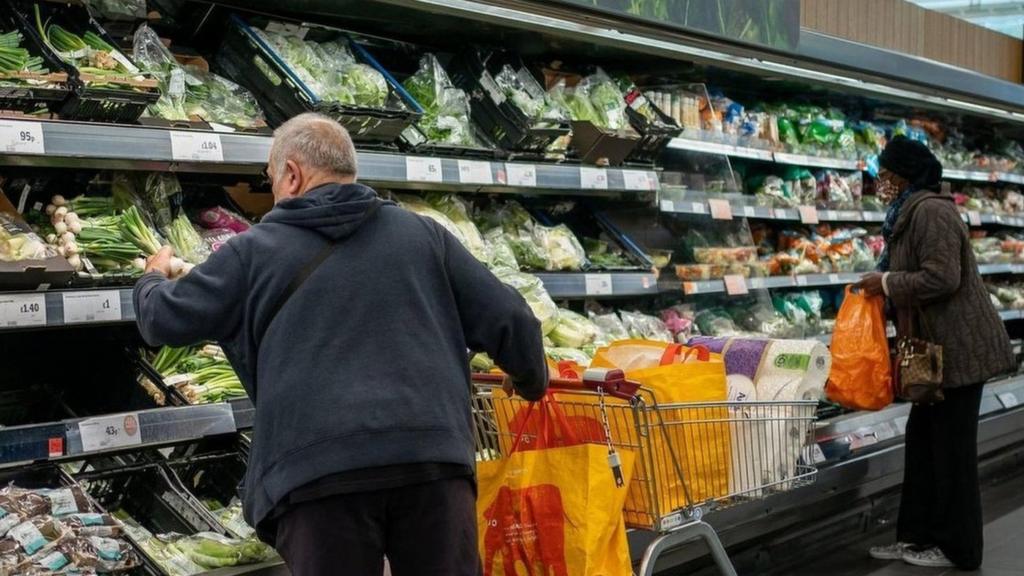 File picture of shoppers in a supermarket