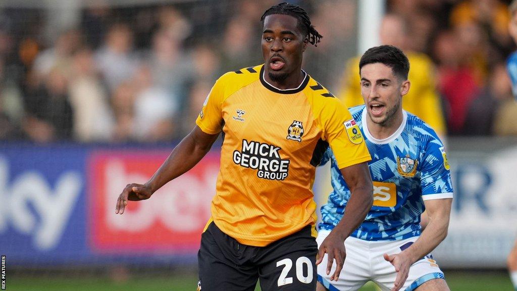 Fejiri Okenabirhie in action for Cambridge United