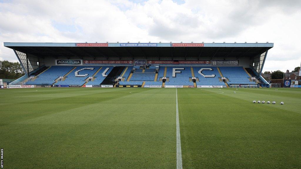 Carlisle's Brunton Park, with view of the Pioneer East Stand and the pitch