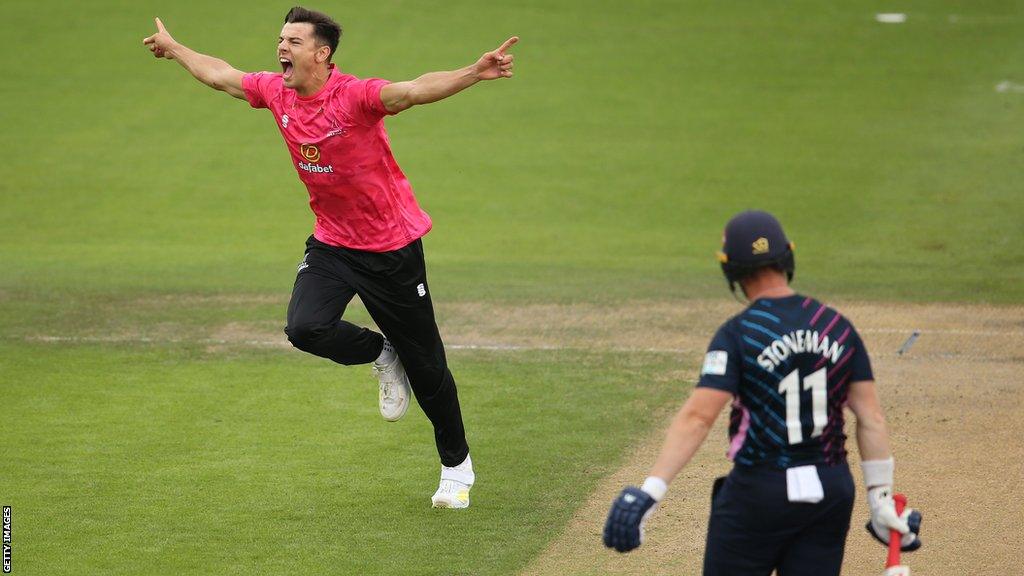 Brad Currie (left) dismisses Middlesex's Mark Stoneman