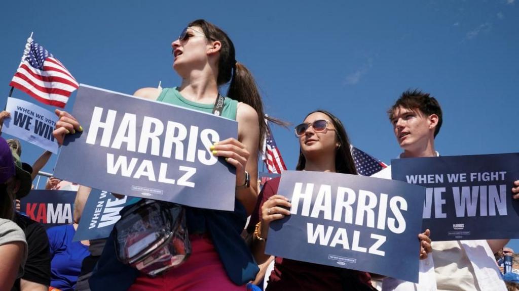 Attendees wait for U.S. Vice President and Democratic presidential candidate Kamala Harris and her running mate Minnesota Governor Tim Walz