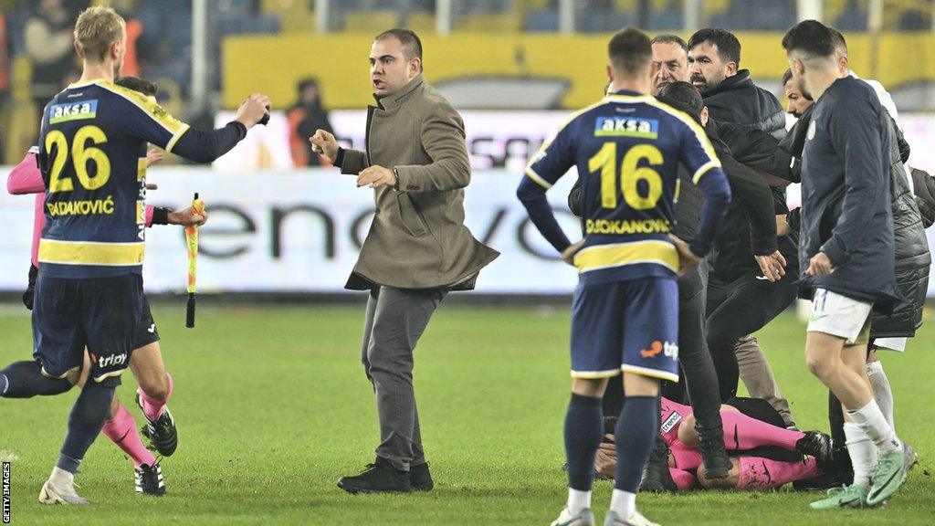 Halil Umut Meler was punched by MKE Ankaragucu president Faruk Koca after his team conceded a 97th-minute equaliser to Caykur Rizespor.
