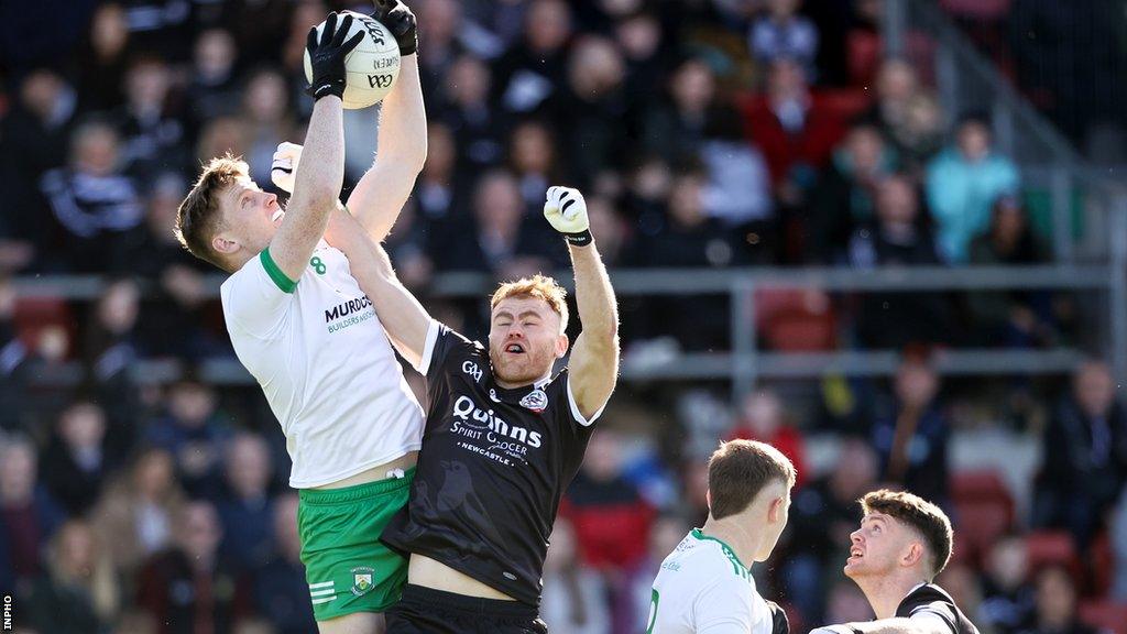 Burren's Odhran Murdock leaps highest to collect the collect in Sunday's final against Kilcoo