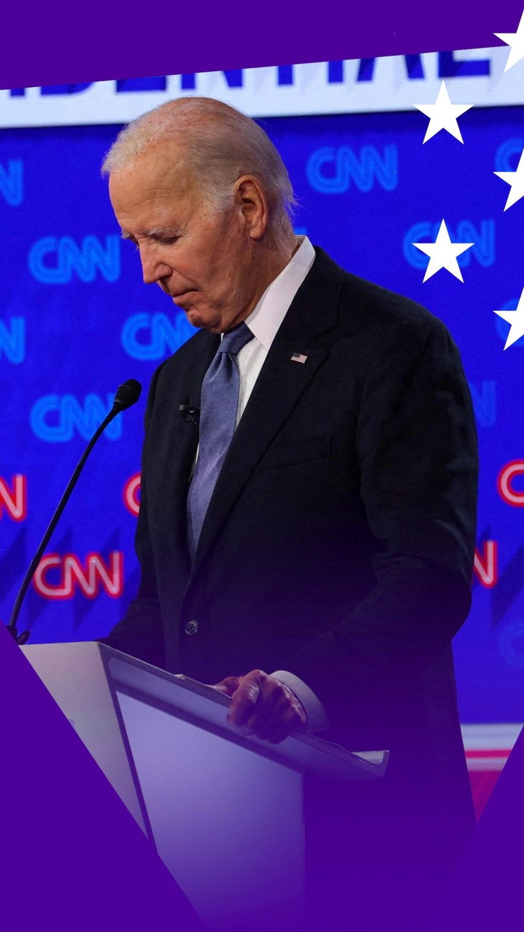 Joe Biden looking down to his mic in the first presidential debate