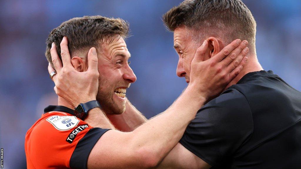 Luton Town manager Rob Edwards celebrating with Jordan Clarke