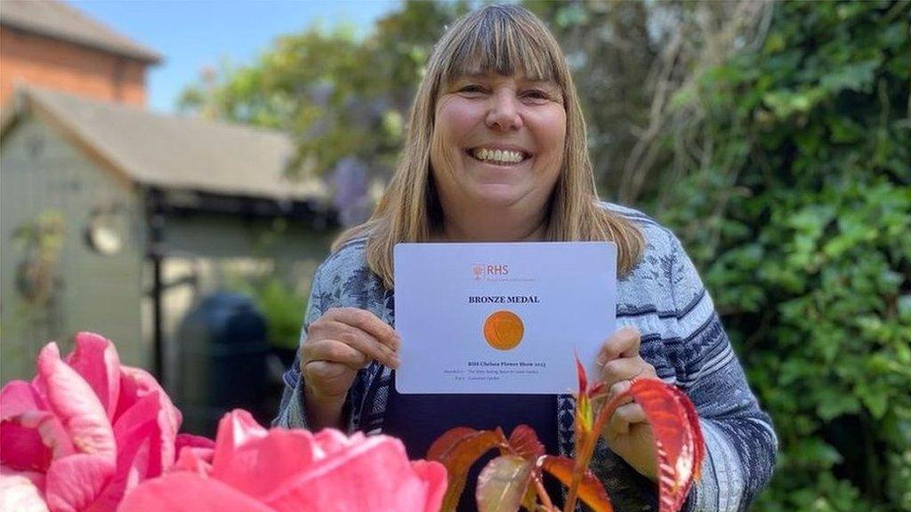 Julie Haylock with her bronze certificate