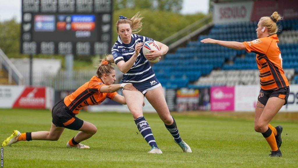 Warrington Wolves secure comeback win and Featherstone Rovers dominate in Women's Super League matches.