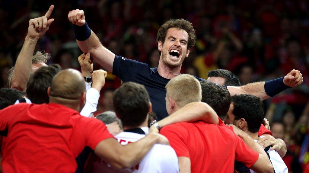 Andy Murray is mobbed by his team-mates after beating David Goffin to win the Davis Cup Final at the Flanders Expo Centre, Ghent.