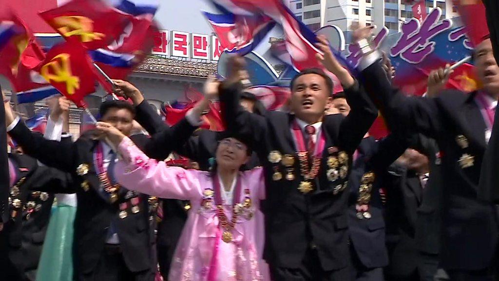 North Koreans at a procession