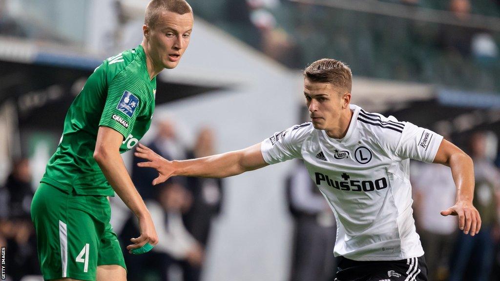 Maik Nawrocki (right) in action for Legia Warsaw