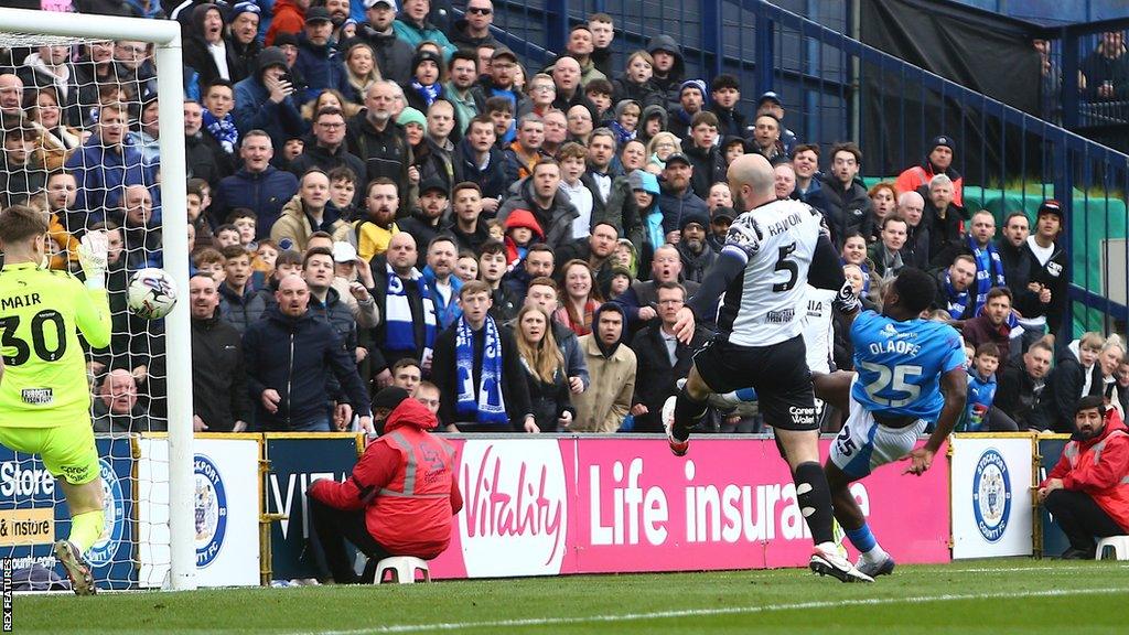 Isaac Olaofe puts Stockport County in front against Morecambe