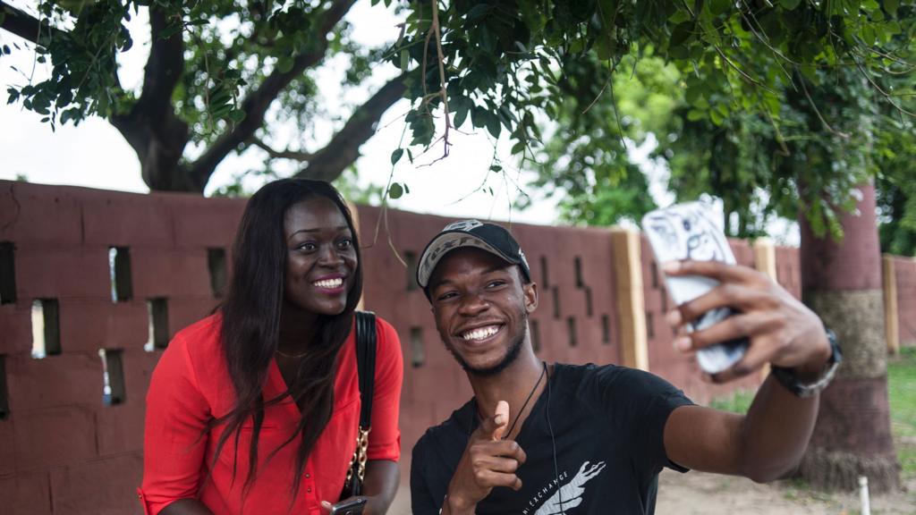 People taking selfies in Lagos, Nigeria