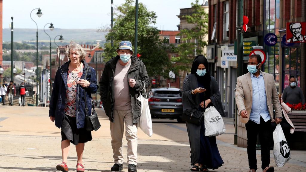 People shopping in Oldham