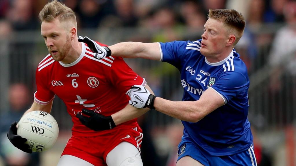 Monaghan's Ryan McAnespie challenges Tyrone's Frank Burns