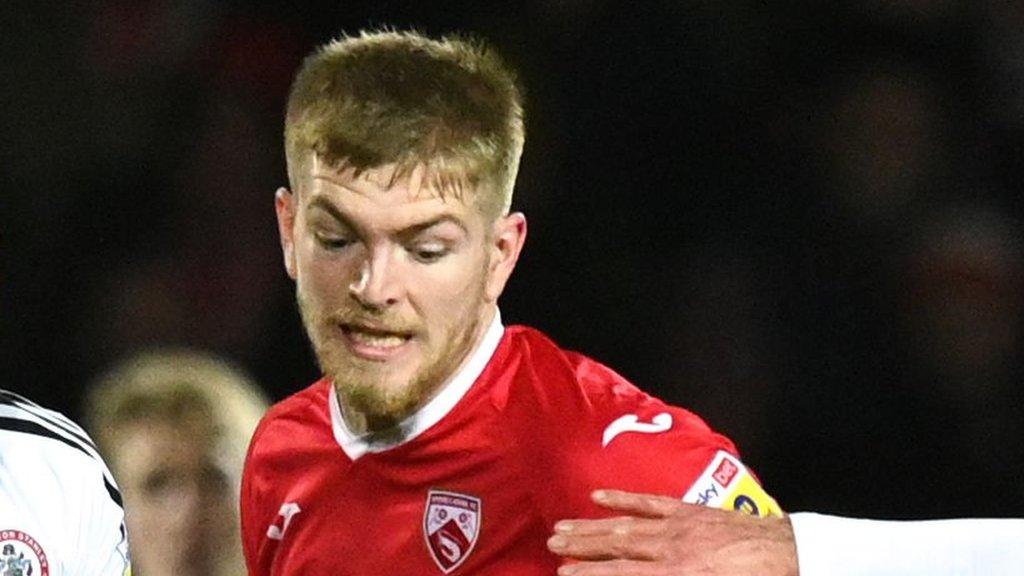 Kieran Phillips in action for Morecambe