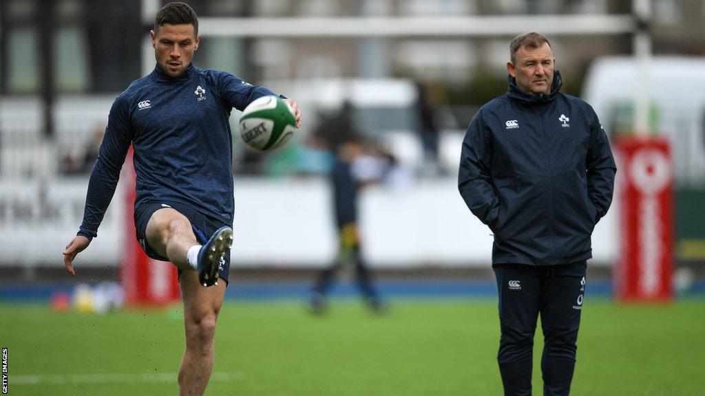 Richie Murphy watches John Cooney during an Ireland training session in February 2020