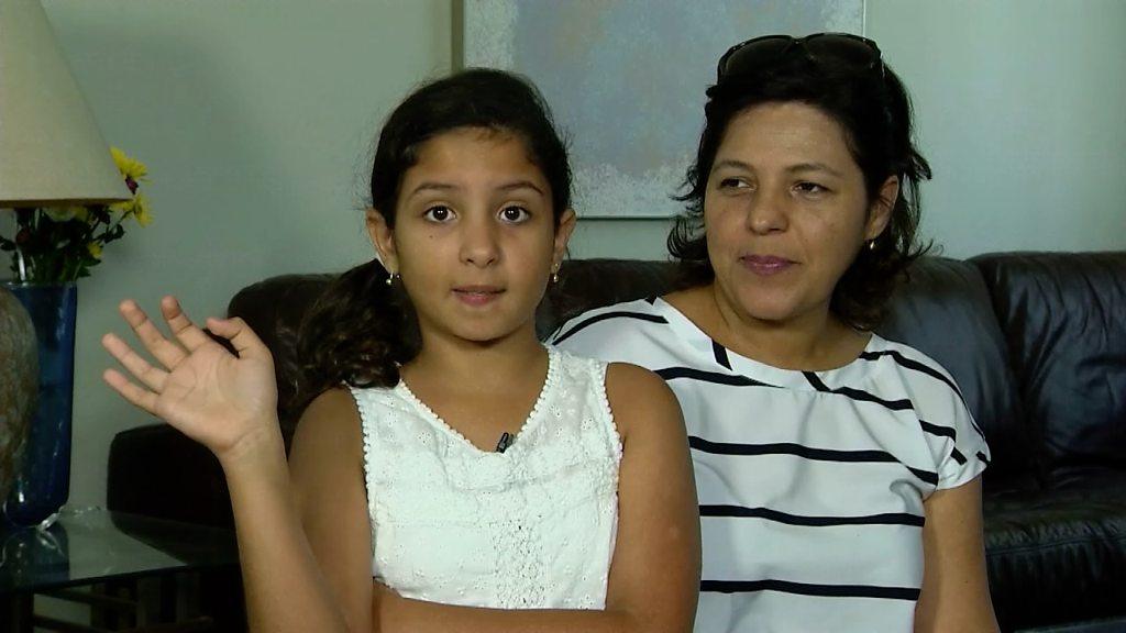 Juliana Ossa seated with her mother