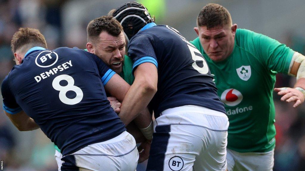 Cian Healy battles against Scotland at Murrayfield