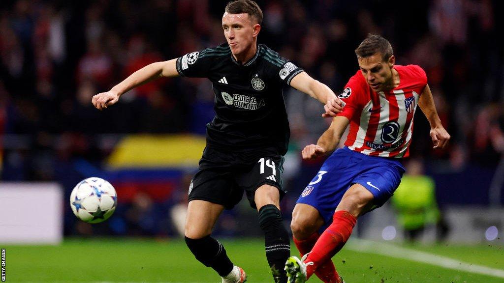 David Turnbull vies with Cesar Azpilicueta during the Champions League match between Atletico de Madrid and Celtic last November